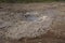 Small, dormant geyser in the Geysir geothermal area