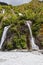 Small double waterfall near Franz Joseph Glacier. New Zealand