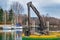 Small dredge floating in the harbor of a lake