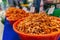 Small dried shrimp, food ingredients. Many tiny shrimps, prawns in a basket on a Vietnamese market