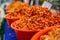 Small dried shrimp, food ingredients. Many tiny shrimps, prawns in a basket on a Vietnamese market