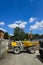 Small dump truck or dumper on a urban construction site. Sunny summer day, no people