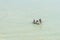 Small Egyptian fishing boat with crew - Suez Canal.