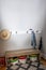 A small entrance mudroom with a hooks for hanging jackets and hats organization which connects the garage to the house