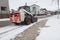 small excavator bobcat working on the street,