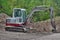 Small excavator, work in the forest, South Bohemia