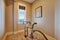 Small exercise room with bicycle