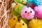 Small fake easter chicks and natural nest material