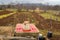 Small farm in Croatia vegetable field, orchard, well in spring