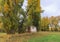 Small farm tool shed abandoned in autumn