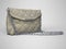 Small female bag over the shoulder with metal buckle 3d rendering on gray background with shadow