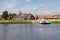 Small ferry crossing river Meuse near Dutch village Broekhuizen