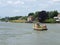 Small ferry over river Hollandsche IJssel between Ouderkerk en Nieuwerkerk aan den IJssel.