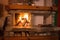 Small fireplace in accommodation in cottage