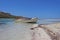 Small fishing boat at lagoon Balos