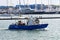 Small fishing boat leaves the port of the Tuscan town of Viareggio