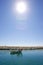 Small fishing boat leaving the port of Duquesa in Spain