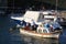 Small fishing boat moored in Assos harbour