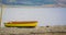 Small fishing boat pulled up on shore in Longyearbyen-