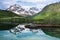 Small fishing boat in scenic fjord on Lofoten,