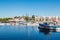 Small Fishing Boats in Blue Harbor Under Blue Sky