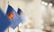 Small flags of the ASEAN on an abstract blurry background