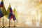 Small flags of the Colombia on an abstract blurry background