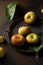 Small flattened apples on a tray on a dark background