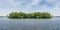 Small foresty island on a big lake