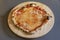 Small four cheese pizza made with wheat flour dough