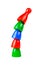 Small game pieces placed standing on top of each other Simple colorful pieces bent curved tower symbol Teamwork, team effort