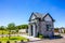 Small Gate House At Subdivision Entrance