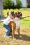 Small girl and Boxer Bulldog.