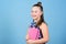 Small girl with pink note book. school child with notepad. Smart and adorable. schoolgirl ready for lesson. school