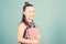 Small girl with pink note book. school child with notepad. Smart and adorable. schoolgirl ready for lesson. school