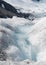 Small Glacial Melt Waterfall on Ice