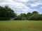 Small grass soccer field irrigated by impact rotating sprinklers