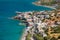 Small Greek coastal village with beach and clear blue sea Plaka, Elounda, Crete