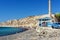 Small Greek tavern near rocky coastline of Vlychada town at Santorini island, Greece
