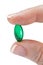 Small green semi transparent pill