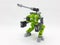 Small Green Transformable Robot Toy On White Isolation Background 13