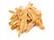 A small group of dehydrated chicken jerky for dog treats on a white background.