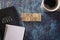 Small Group Written in Block Letters on a Wooden Table with a Black Bible