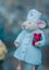 Small hand-made felt mouse in medical gown, doctor mouse, selective focus