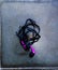 A small headset with black-and-purple color