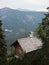 Small Hiking Rest House on Cliff Overhang with Mountain View