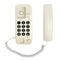 Small home landline phone with the Russian alphabet on the buttons, isolated on a white background