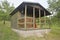 Small house cabin shed. Cute summer cabin in rural orchard.