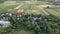 Small houses. Green fields. Aerial view of the village