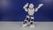 Small human-like robot makes dance moves on stand